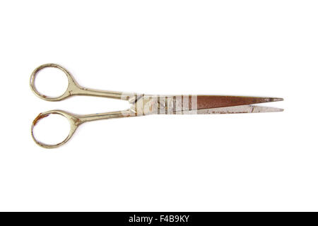 Old and used scissors isolated on a white background Stock Photo
