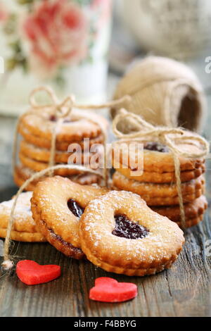 Biscuits and marzipan red hearts. Stock Photo