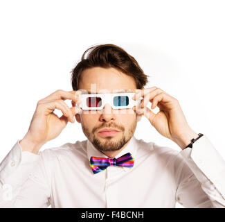 Serious young man wearing 3d glasses Stock Photo