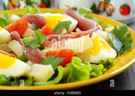 Colorful salad with anchovies. Stock Photo