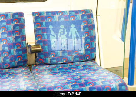 Seat for pregnant or elderly passengers on London Underground, Highgate, Greater London, England, United Kingdom Stock Photo