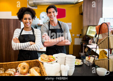Staff smiling at camera together Stock Photo