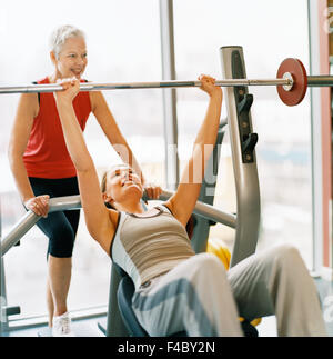 20-24 years 70-74 years 75-79 years activity adults only athlete bodybuilding color image elderly woman exercising grey-haired Stock Photo
