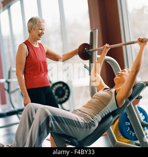 20-24 years 70-74 years 75-79 years activity adults only athlete bodybuilding color image elderly woman exercising grey-haired Stock Photo