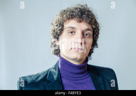 Curly white man in studio Stock Photo