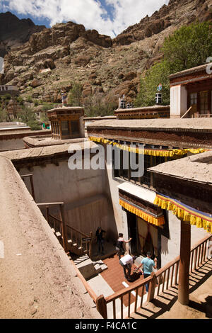 India, Jammu & Kashmir, Ladakh, Hemis Gompa Monastery, visitors taking shoes off outside upper floor temple Stock Photo