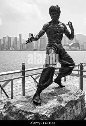 HONG KONG - MARCH 15: Bruce Lee statue on the Avenue of Stars on March 15, 2013 in Tsim Sha Tsui, Hong Kong. The statue is one o Stock Photo
