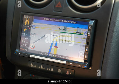 POZNAN, POLAND - AUGUST 20, 2015: GPS navigation in interior of modern car, navigation on the streets of Poznan Stock Photo