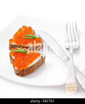 sandwich with red caviar in the form of a heart Stock Photo