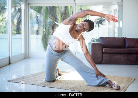 Black Woman Studio Portrait Stretching Arms Fitness Exercise Muscle Health  Stock Photo by ©PeopleImages.com 656518966