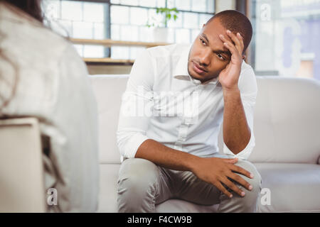 Depressed patient with counselor Stock Photo