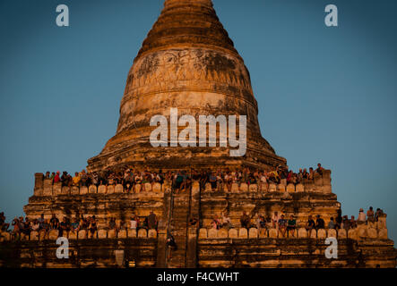 People watching Sunset at Shwesandaw Pagoda in Burma Myanmar Stock Photo
