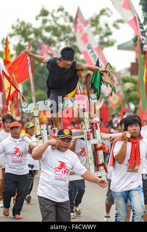 The shaman  of Singkawang. This celebration is highlighted with the parade of the ancient of Tatung. Stock Photo