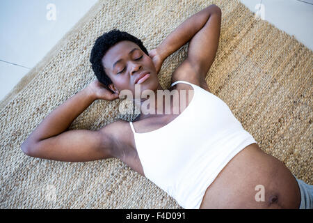 High angle view of relaxed pregnant woman lying Stock Photo