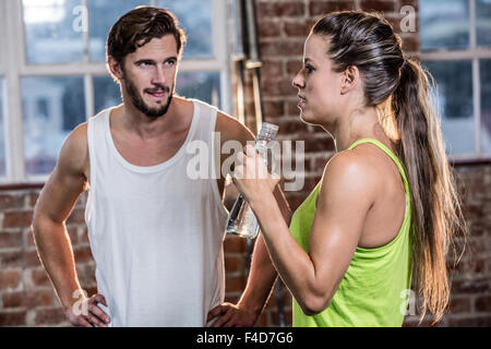 Fit people chatting in studio Stock Photo