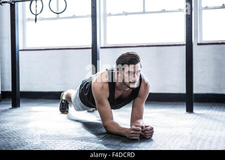 Fit man working out in studio Stock Photo