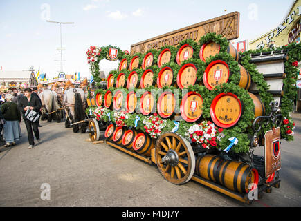 MUNICH, GERMANY - SEPTEMBER 30: Horses pulling beer barrels on the Oktoberfest in Munich, Germany on September 30, 2015. Stock Photo