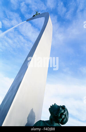 Statue beside fountain, low angle view Stock Photo