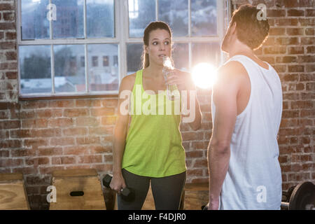 Fit people chatting in studio Stock Photo