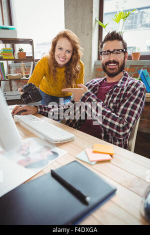 Portrait of man pointing towards camera Stock Photo