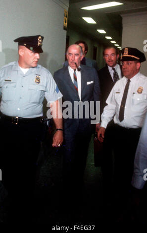 Attorney General John Mitchell enters the Senate office building to testify before the Watergate committee in May 1973. Stock Photo