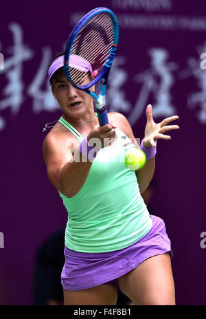 Tianjin. 17th Oct, 2015. Danka Kovinic of Montenegro returns the ball against Bojana Jovanovski of Serbia during their singles' semifinal of 2015 Tianjin Open Tennis Tournament at Tianjin Tuanbo International Tennis Center in Tianjin, China on Oct. 17, 2015. Danka Kovinic won 2-1. Credit:  Yue Yuewei/Xinhua/Alamy Live News Stock Photo