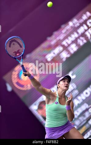 Tianjin. 17th Oct, 2015. Danka Kovinic of Montenegro serves to Bojana Jovanovski of Serbia during their singles' semifinal of 2015 Tianjin Open Tennis Tournament at Tianjin Tuanbo International Tennis Center in Tianjin, China on Oct. 17, 2015. Danka Kovinic won 2-1. Credit:  Yue Yuewei/Xinhua/Alamy Live News Stock Photo