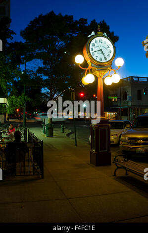 USA, Washington, Walla Walla. Evening light from a restaurant in ...