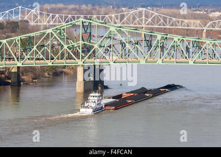 Parkersburg, West Virginia. Coal barges on Ohio River pass under three bridges, Parkersburg-Belpre, CSX railroad, Memorial Stock Photo