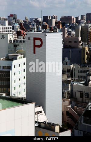 It's a photo of a Parking Tower in Naha in Okinawa island in Japan. We can see the big letter P for Parking Stock Photo