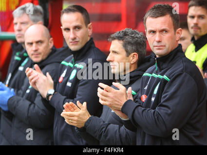 Fir Park, Motherwell, Scotland. 17th Oct, 2015. Scottish Premier League. Motherwell versus Celtic. Ronny Deila and the rest of the Celtic backroom staff during the minutes applause for Joe Wark Credit:  Action Plus Sports/Alamy Live News Stock Photo