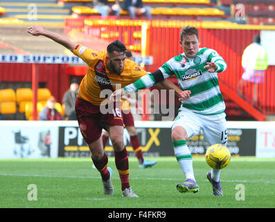 Fir Park, Motherwell, Scotland. 17th Oct, 2015. Scottish Premier League. Motherwell versus Celtic. Kris Commons shoots in the box whilst Kieran Kennedy tries to block Credit:  Action Plus Sports/Alamy Live News Stock Photo