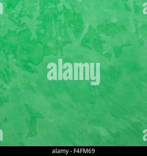 Background of green Venetian plaster. Stock Photo