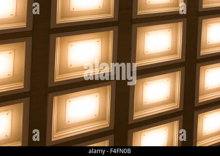 blurred background in the form of square lamps tubes Stock Photo