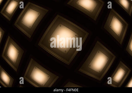 blurred background in the form of square lamps tubes Stock Photo