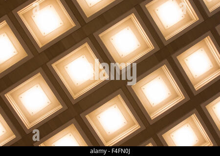 blurred background in the form of square lamps tubes Stock Photo