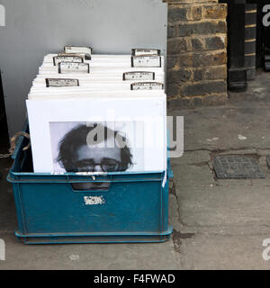 London - January 17, 2015. Flea market window shop with old-fashioned goods displayed in London city, UK, on 13 June 2014. Retro Stock Photo