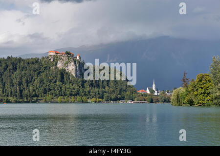 Medieval castle and St. Martins Parish Church overlooking the Bled Lake in Slovenia. One of the picturesque sites of the nation. Stock Photo