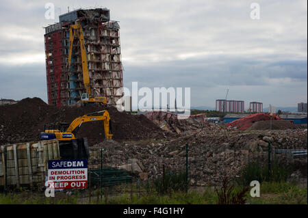 Glasgow, Scotland 11th of October 2015. The demolition of the Red Road Flats that were partially demolished is currently being demolished with heavy machinery due to the two remaining towers that did not fully come down with the explosion. Piles of rubble are in place of where the towers stood. Specicialist equipment being used to demolish the remaining towers. Credit:  Andrew Steven Graham/17�Թ����� Live News Stock Photo