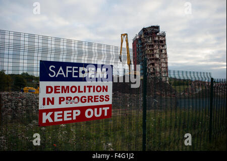 Glasgow, Scotland 11th of October 2015. The demolition of the Red Road Flats that were partially demolished is currently being demolished with heavy machinery due to the two remaining towers that did not fully come down with the explosion. Piles of rubble are in place of where the towers stood Credit:  Andrew Steven Graham/Alamy Live News Stock Photo