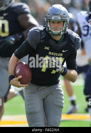 Baylor Quarterback Seth Russell (17) Warms Up As Head Coach Art Briles 