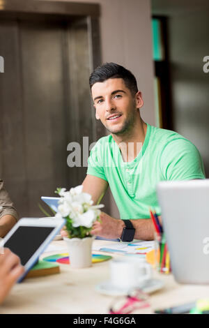Group of students working on assignments Stock Photo