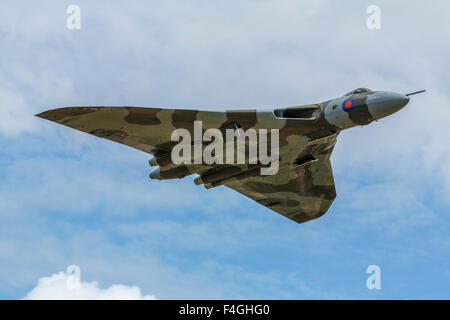 Cold War nuclear strike attack aircraft, Avro Vulcan Bomber XH558 in flight England UK Stock Photo