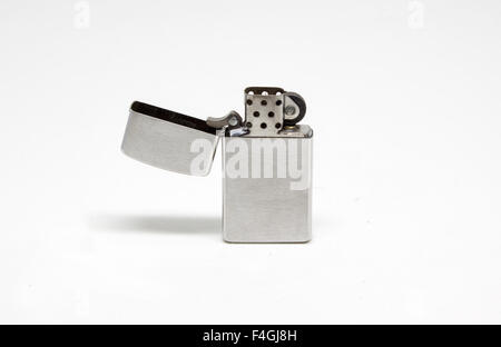 Open brushed metal lighter isolated on white background Stock Photo