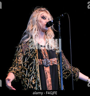 The Pretty Reckless performs live on tour.   The Pretty Reckless is an American rock band from New York City. The current members are Taylor Momsen (lead vocals, rhythm guitar), Ben Phillips (lead guitar, backing vocals), Mark Damon (bass) and Jamie Perkins (drums). Stock Photo