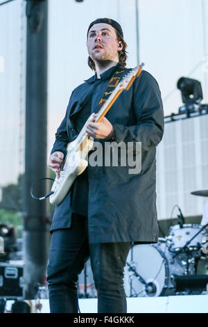 Music Artist THE NEIGHBOURHOOD performs at the Red Hat Amphitheater in North Carolina.  The Neighbourhood (sometimes stylized as 'THE NBHD') is an American rock band formed in August 2011. The band is composed of vocalist Jesse Rutherford, guitarists Jeremy Freedman and Zach Abels, bassist Mikey Margott and drummer Brandon Fried. Stock Photo