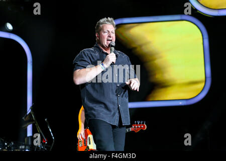 Music artist RASCAL FLATTS bring their 2013 Summer Tour to Walnut Creek in Raleigh, NC.  Rascal Flatts is an American country music group composed of Gary LeVox (lead vocals), Jay DeMarcus (bass guitar, keyboard, piano, vocals) and Joe Don Rooney (lead guitar, vocals). LeVox and DeMarcus are second cousins. Stock Photo