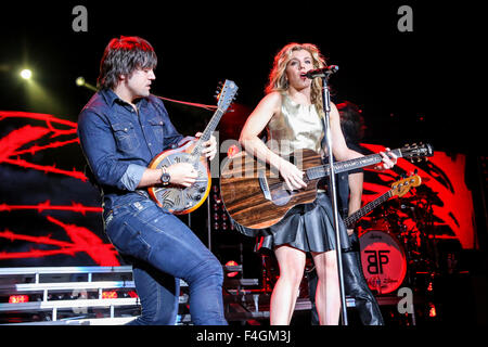 Music artist THE BAND PERRY bring their 2013 Summer Tour to Walnut Creek in Raleigh, NC.  The Band Perry, an American country music group, is composed of siblings Kimberly Perry (lead vocals, guitar, piano), Reid Perry (bass guitar, background vocals), and Neil Perry (mandolin, drums, accordion, background vocals). Stock Photo