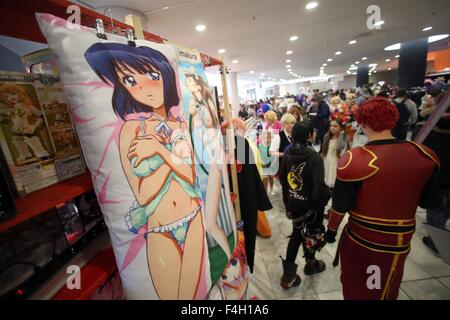 Frankfurt, Germany. 17th Oct, 2015. A fair stand for comic and cosplay fans offers a variety of articles and pillows which are decorated with slightly dressed manga characters during the 2015 Frankfurt Book Fair in Frankfurt, Germany, 17 October 2015. Photo: Fredrik von Erichsen/dpa/Alamy Live News Stock Photo