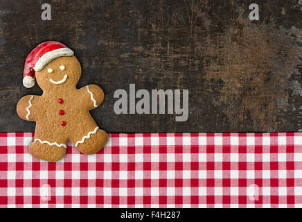 A gingerbread man on a baking tray Stock Photo